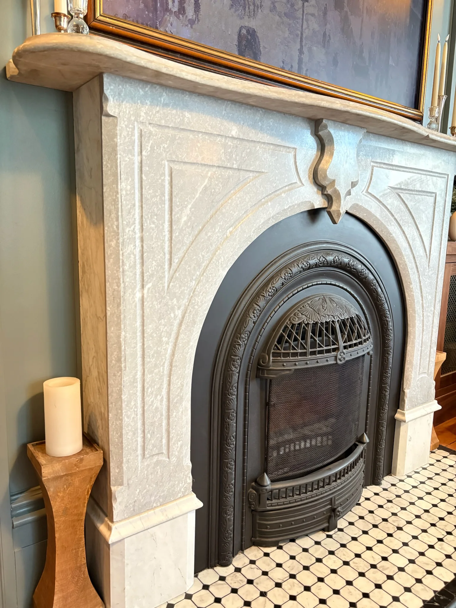 Close view of the marble fireplace surround and hearth tile
